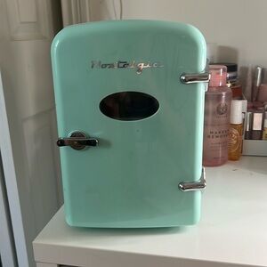 Nostalgia mini fridge, Teal, works perfectly, and lightly used.